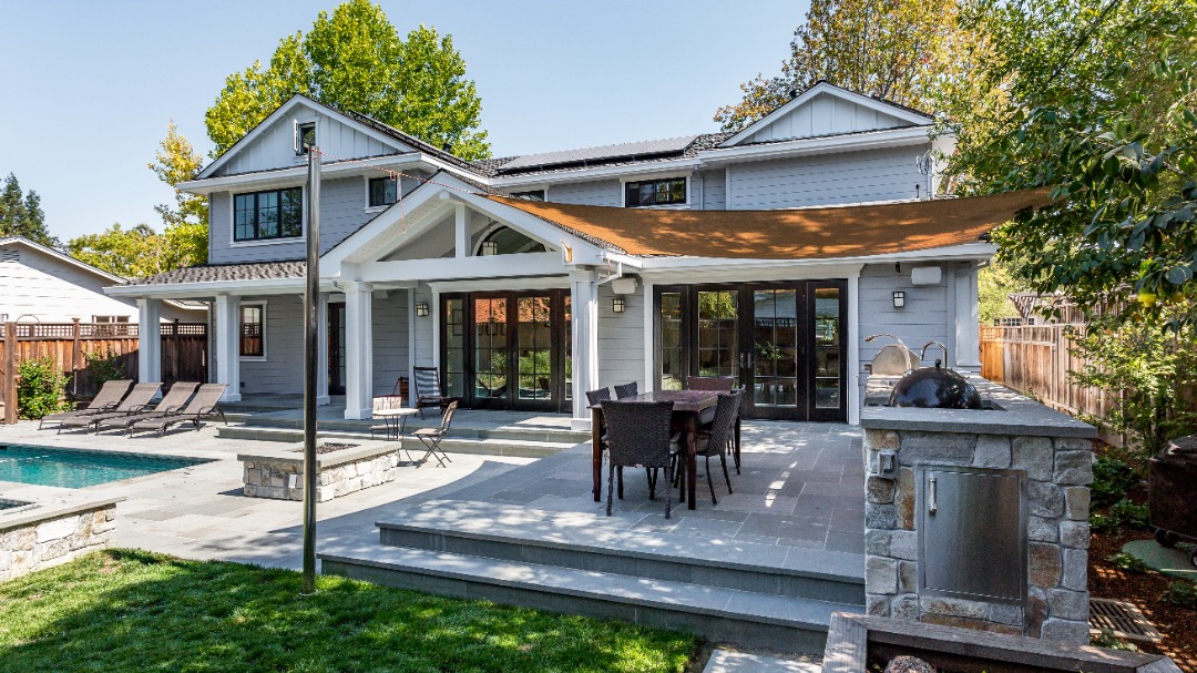 aeroscapesllc-outdoor-living-spaces-argyle A gorgeous outdoor living space connected to a pool.